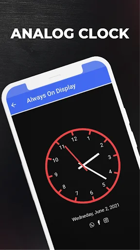 Analog clock display on AMOLED screen with red clock hands showing time on black background for battery saving