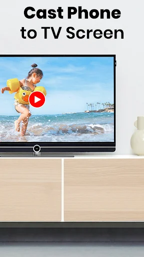Child at beach playing on TV screen demonstrating successful phone-to-TV mirroring and video casting capability