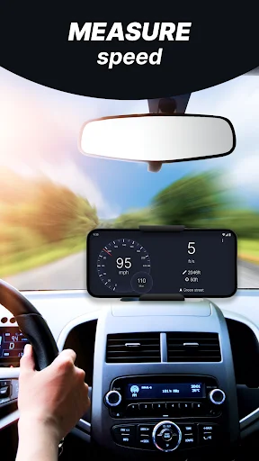GPS speed tracker app mounted on car dashboard measuring vehicle speed while driving on road